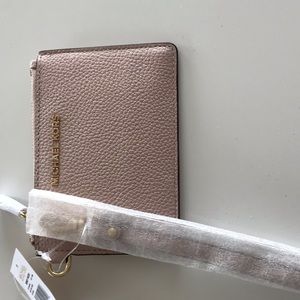 Michael Kors wristlet in light pink